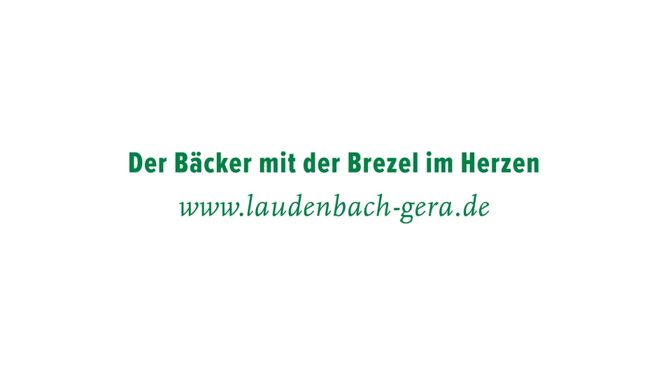Schriftzug „Der Bäcker mit der Brezel im Herzen“ mit Webadresse
